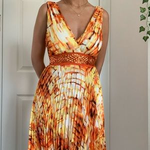 Orange pleated summer dress